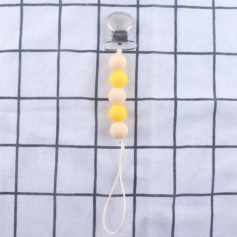 Cadena de pezón de silicona calmante Nuevo clip de hierro clip de pezón Dispositivo de molienda de dientes de bebé cadena anti-caída cadena anti-perdida