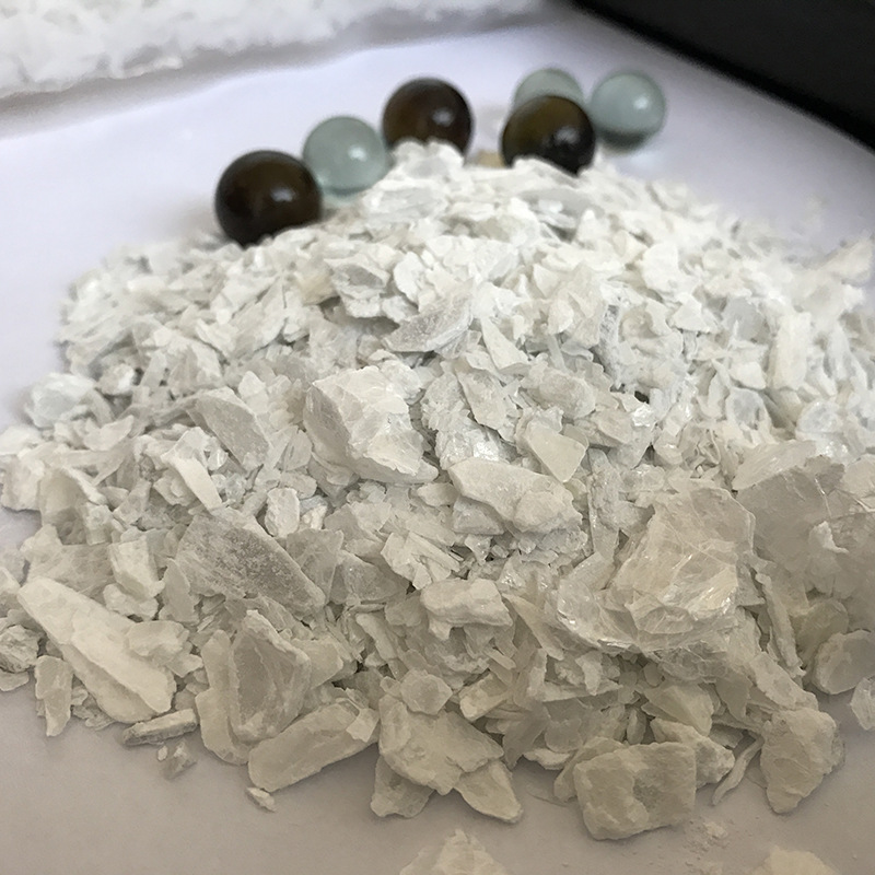 融雪剂防火板用 无水片状氯化镁 大块状氯化镁吨块状99% 厂家供应