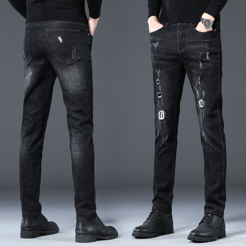 Autumn new men's jeans slim feet stretch Joker pants men Korean fashion pants a generation of hair