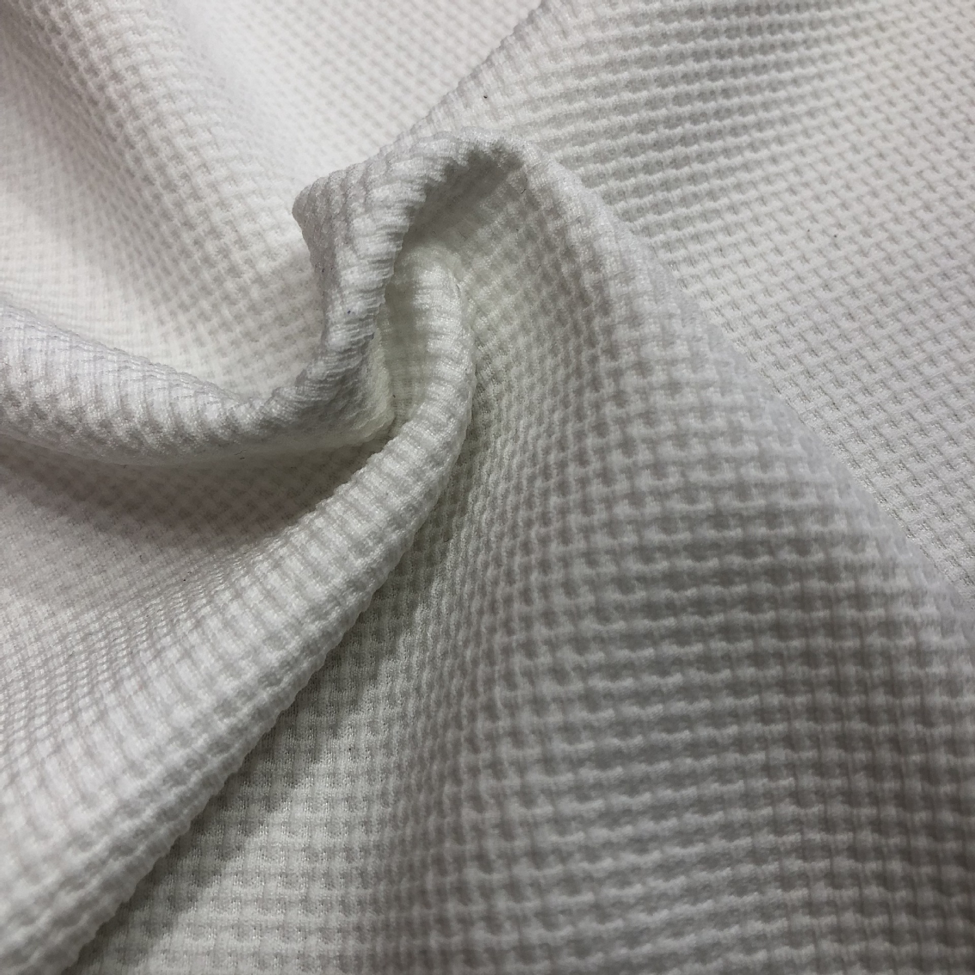 现货供应 涤纶针织面料280克 玉米格 华夫格 魔方格 泳装面料