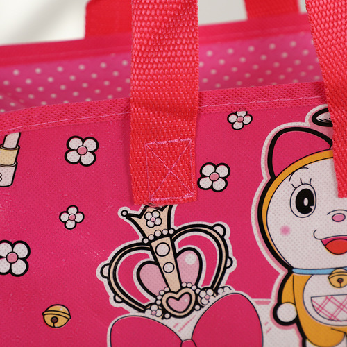 Amazon cross-border manufacturer new cartoon non-woven hand-held shopping bag color coated student school bag gift bag