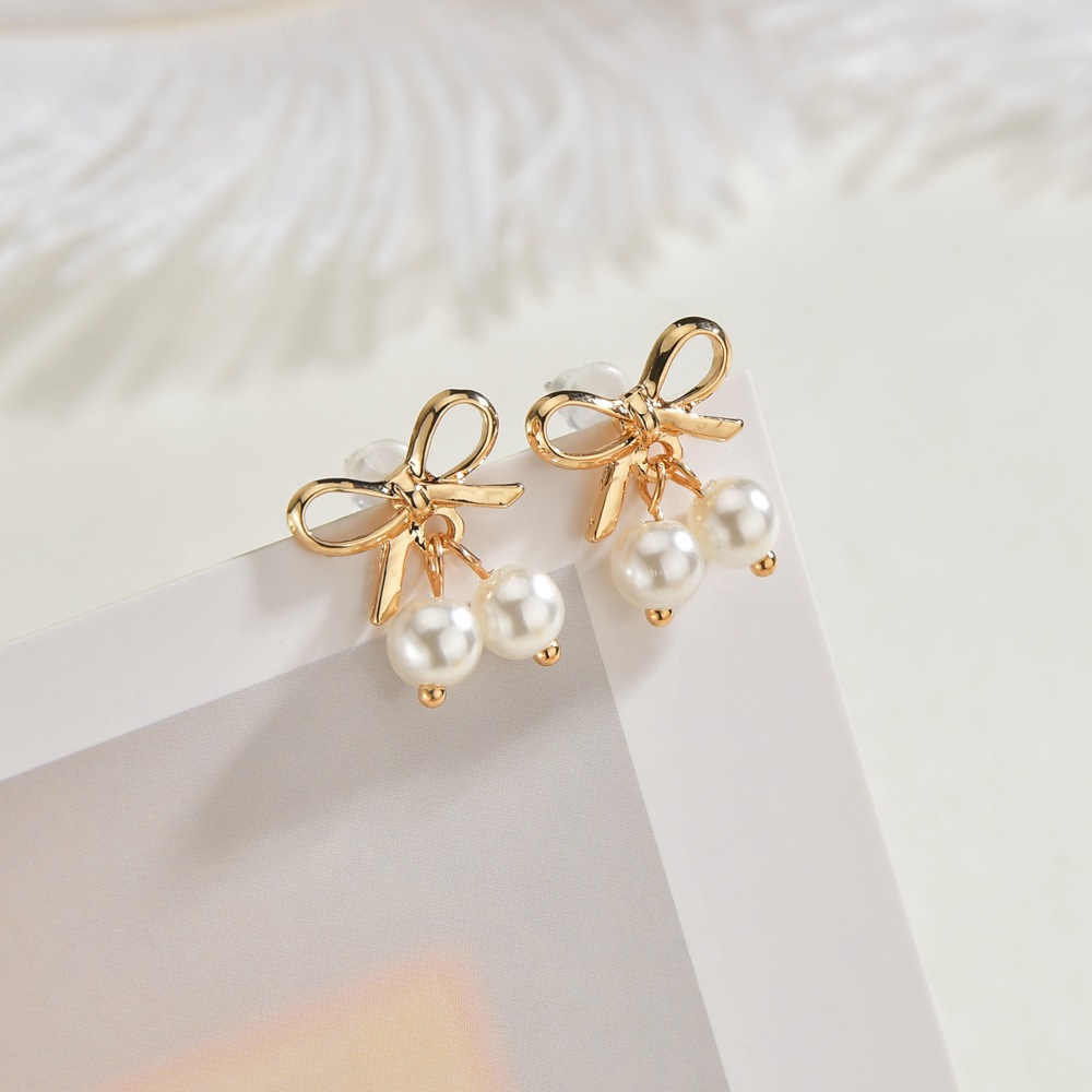 Bow Pearl Earrings Female Compact Personality Temperament Earrings display picture 4