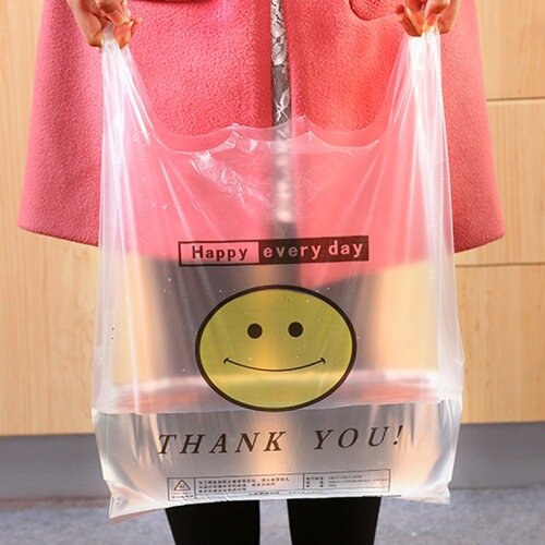 Factory goods transparent smiley face plastic bag fruit takeaway packaged shopping bag hand-held vest bag vest bag wholesale