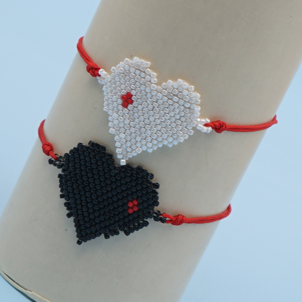 Pulsera De Estilo Étnico Con Borla De Amor Tejida A Mano Con Cuentas De Arroz En Caliente Para Mujer display picture 1