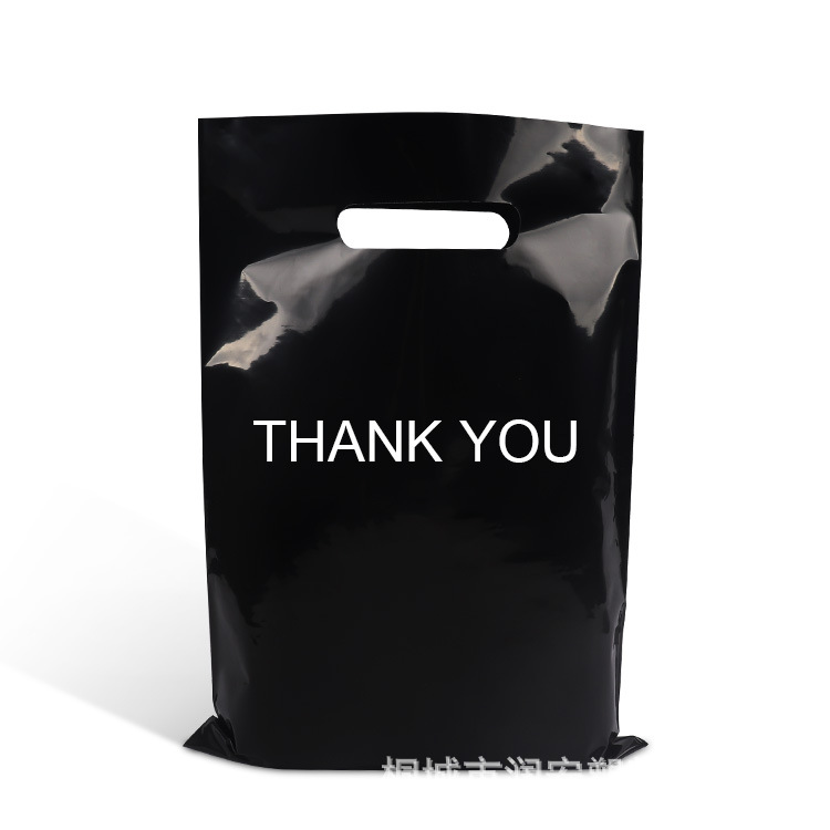 Ropa de ropa para niños bolsas de plástico ropa de cuatro dedos bolsas de mano personalizadas logo agujero agujero mano bolsa de ropa interior