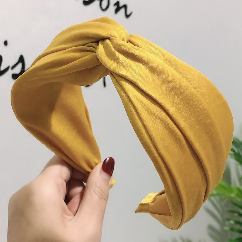 Korean Wave  Fashion Wide-brimmed Solid Color Cross-knotted Fabric Hair Accessories Mori Girl Hair Hoop Wholesale Nihaojewelry display picture 1