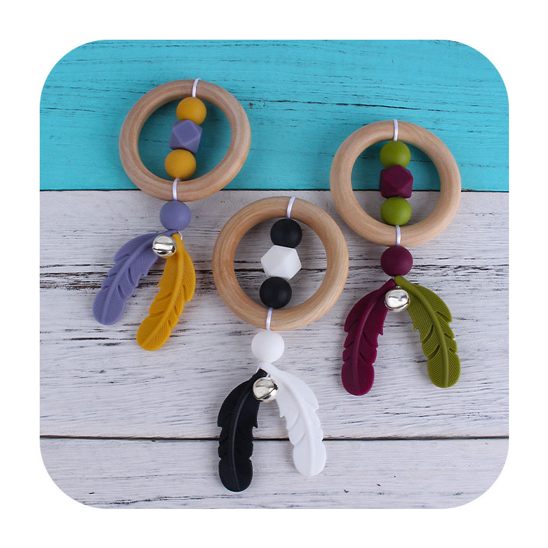 Nueva historieta DIY Hemu anillo de mano sonajero juguete mordedor infantil cuentas de plumas de silicona dientes de molienda palo
