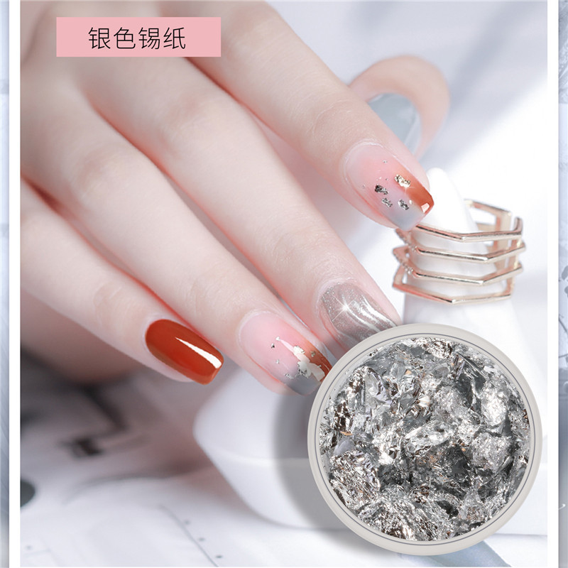 Nail Art oro plata hoja de papel DIY decoración de uñas suministros ultrafino papel de oro papel de impresión pegatinas de papel transfronterizo exclusivo