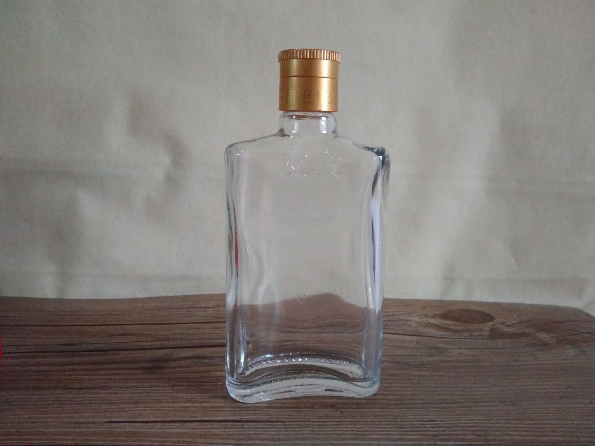 新款110ML扁圆弧形玻璃白酒瓶 异形保健养生劲酒瓶 现货