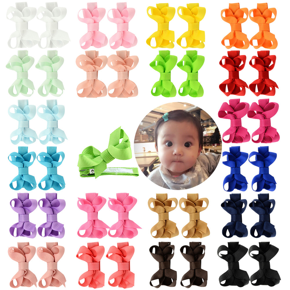 Hot Selling Multi-color Children's Solid Color Bow Hairpin Set display picture 1