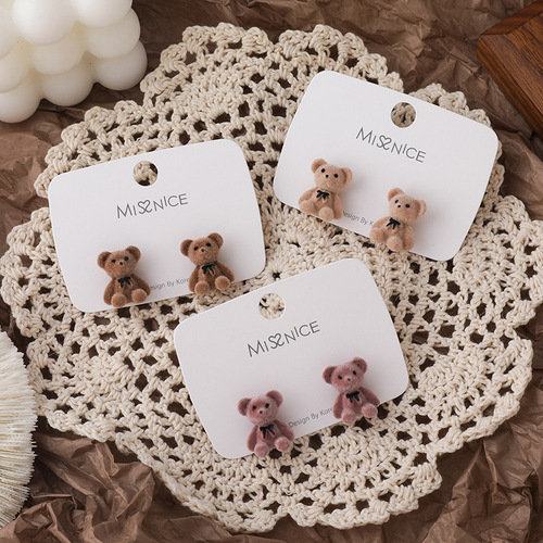 Cute flocked bow bear earrings Japanese and Korean cartoon girl earrings autumn and winter versatile Internet celebrity plush ear jewelry