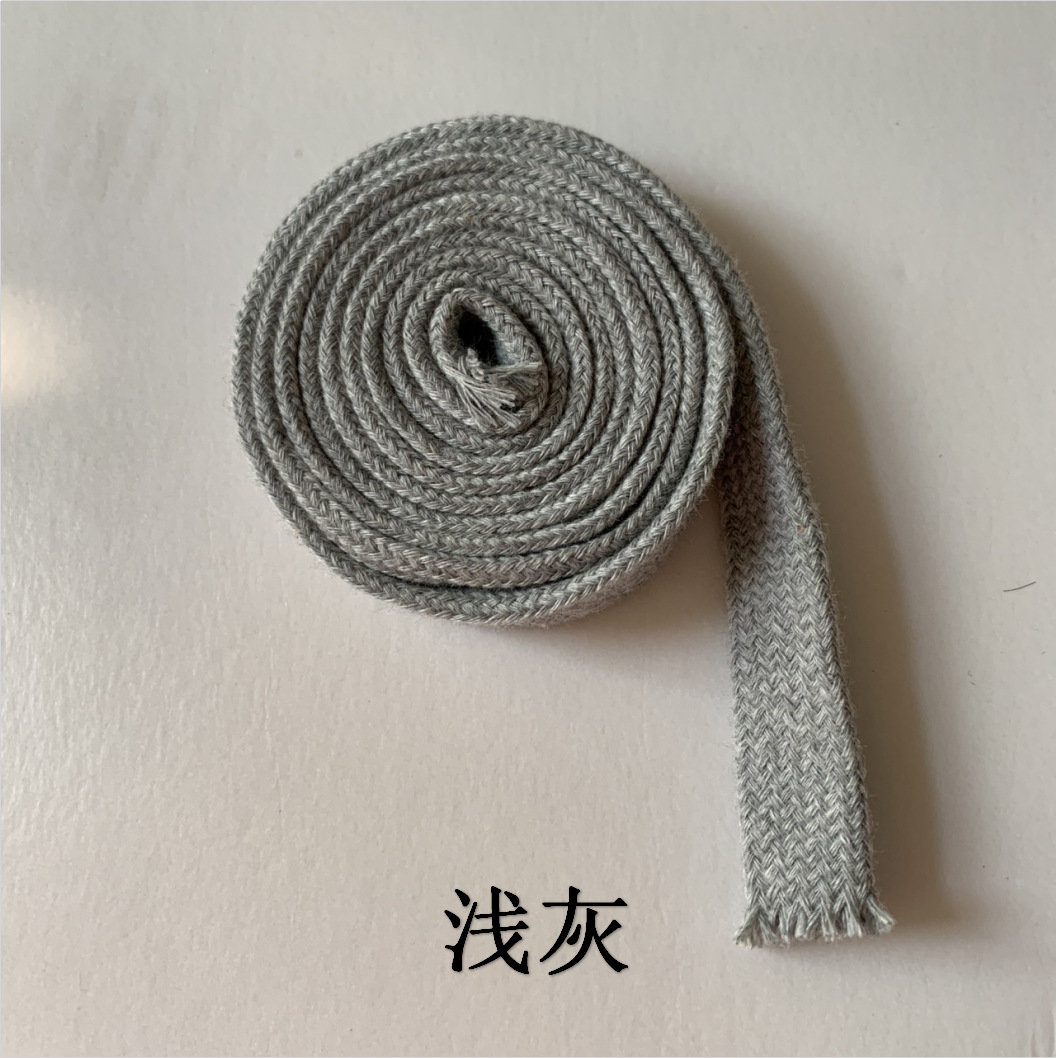 Fabricante en stock cinta de color 1,5 CM cuerda de algodón plana hueca de doble capa ropa tejida sombrero cuerda de la cintura cordón