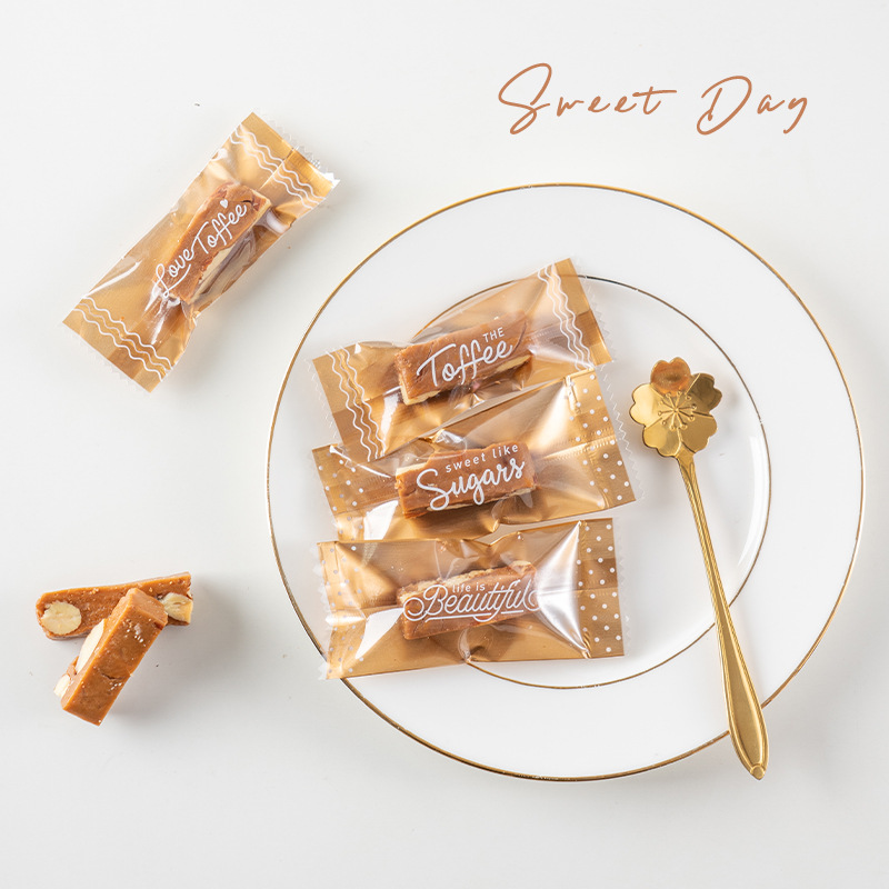 太妃糖袋牛轧糖包装袋机封袋 创意透明英文牛扎糖包装纸100只入