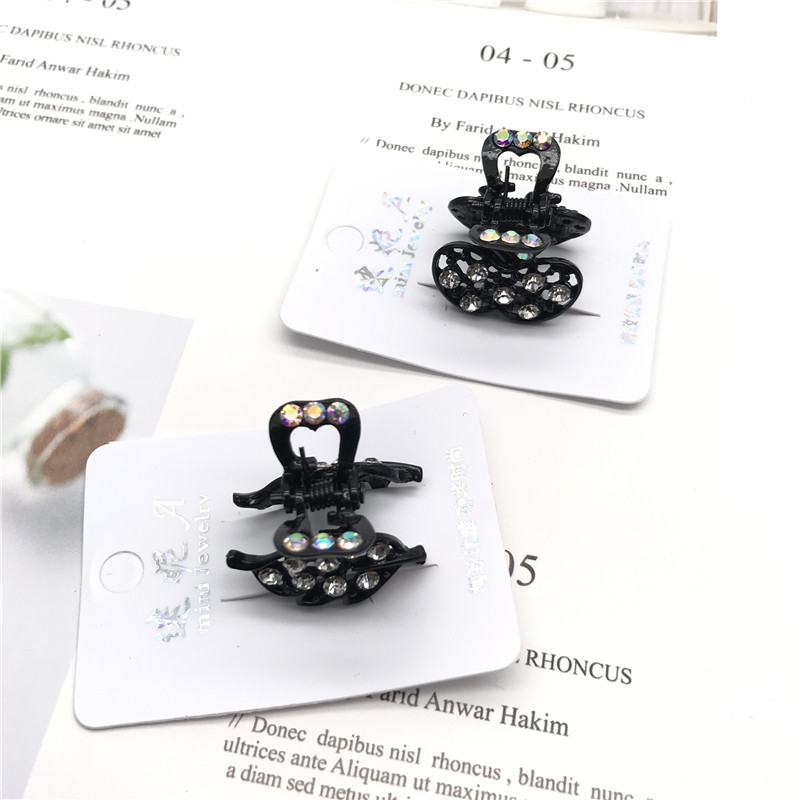 Venta caliente negro diamante incrustado pequeño clip superior clip lateral un yuan una pieza dos yuanes tienda accesorios para el cabello cabeza accesorios puesto de suministro