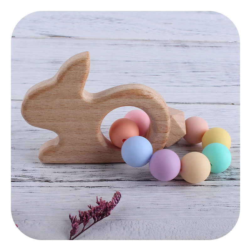 Nuevo DIY creativo de dibujos animados de haya de juguete mordedor pulsera bebé Seguridad Protección del Medio Ambiente cuentas de silicona pulsera mordedor palo