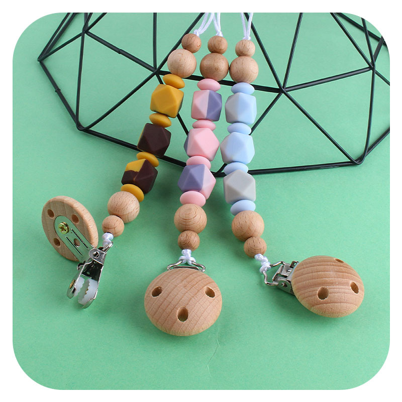 Suministros para bebés nuevo clip de chupete de haya DIY creativo de dos colores de silicona octogonal cuentas de juguete mordedor chupete cadena