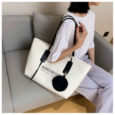 夏天網紅大包包2020新款潮簡約手提大容量時尚單肩女包百搭托特包