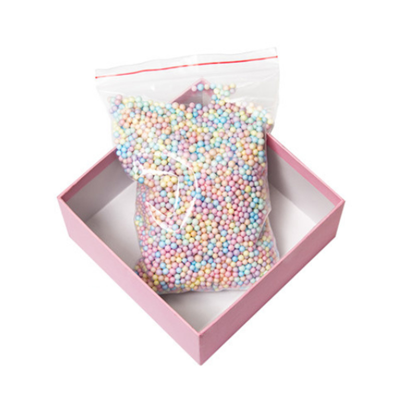 Macaron color bola de espuma TikTok caja de regalo flujo de partículas planeta caja de regalo Internet celebridad relleno 25g ventas directas de fábrica