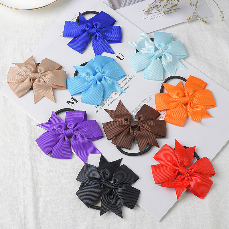 Children's elastic hairgrip with bow