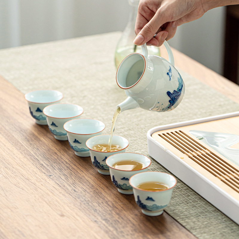 Zhuozhong en relieve pintado a mano taza justa mango de cerámica dispensador de Té celadón té de mar juego de té taza masculina taza de té grande