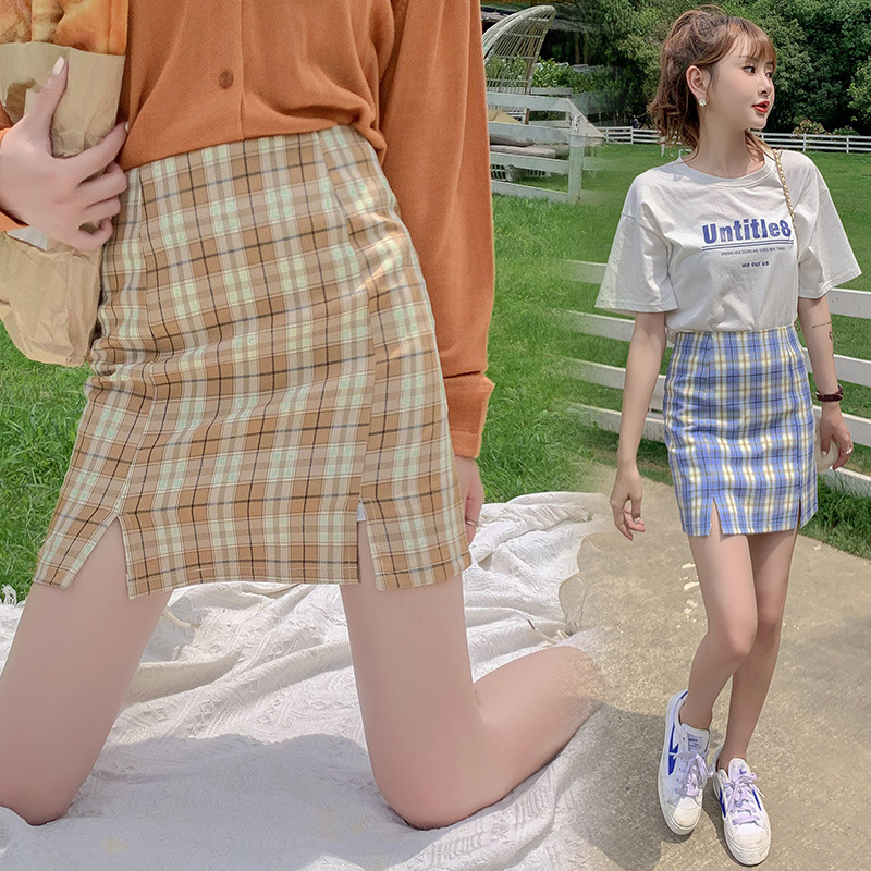 Plaid half-length skirt female short skirt 2021 new pleated skirt Korean version of the student wind high waist pork A letter bag hip skirt