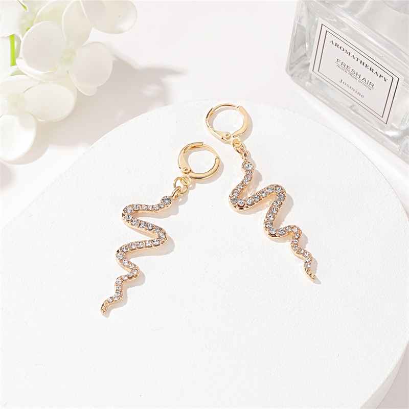 Waves Pattern Women'S Gender Plating Design Fashion Waves Plating Alloy Artificial Gemstones Drop Earrings