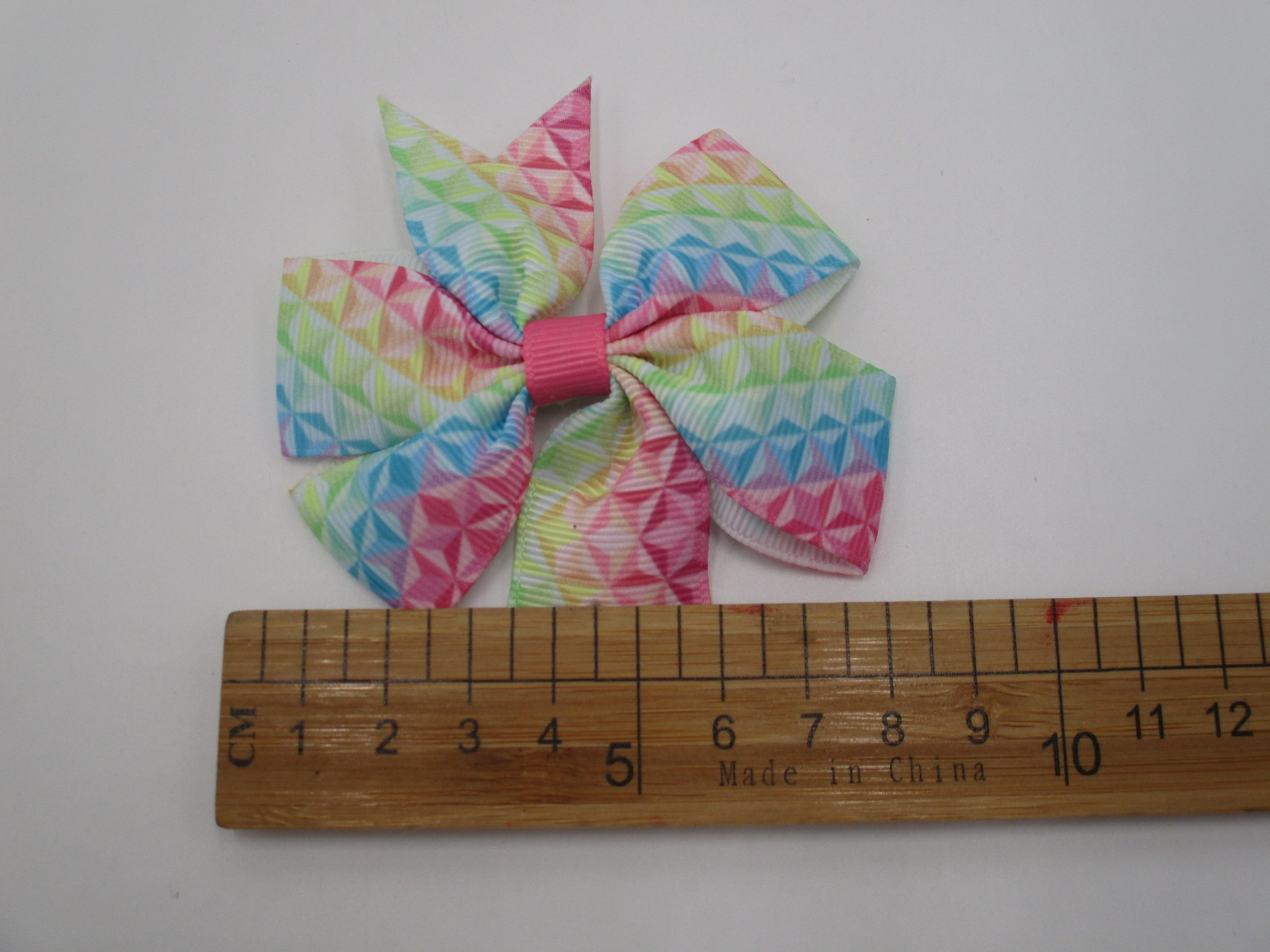 Rainbow children's hairgrip with bow