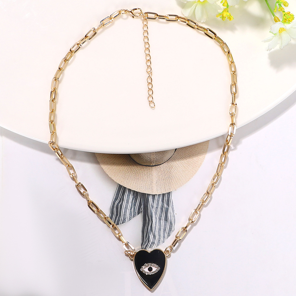 Black Heart-shaped Diamond-studded Dripping Eyes Fashion Devil's Eyes Peach Heart Necklace For Women display picture 3