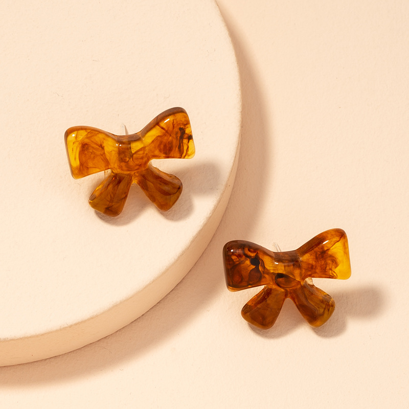 S925 Silver Needle Korean Retro Resin Amber Bow Earrings display picture 3