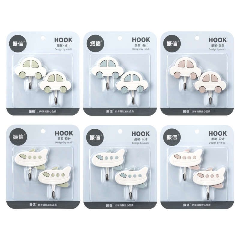 Tienda de departamentos al por mayor ropa creativa gancho de plástico nórdico simple gancho pegajoso fuerte detrás de la puerta cocina 972 gancho pegajoso