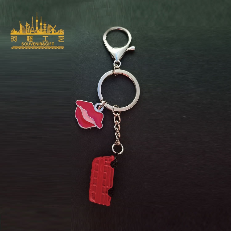 London, UK with Lobster chain keychain manufacturers spot Tower Bridge bus car lip keychain metal