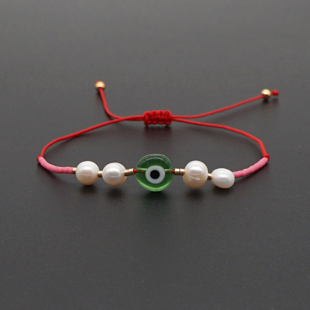 Corea Simple Mal De Ojo Pequeño Brazalete Importado Perlas De Arroz Myuki Perlas De Agua Dulce Naturales Tejidas A Mano Cuerda De Amistad display picture 3