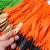 Green hair rope with flat rubber bands, orange slingshot, 12 pair