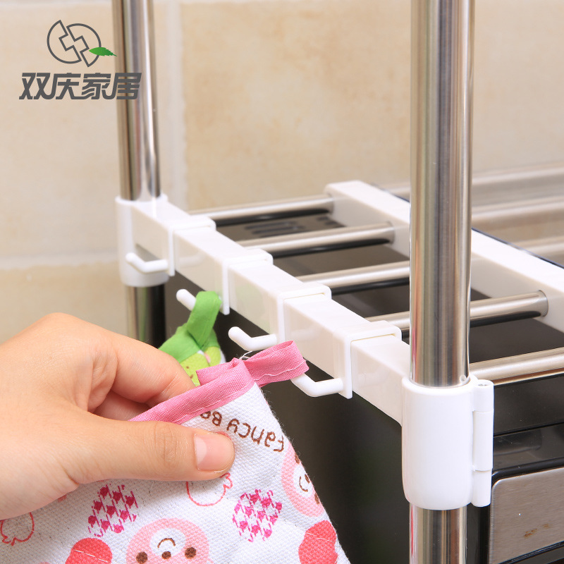 Estante de cocina personalizado Estante de almacenamiento de horno de microondas telescópico de acero inoxidable Estante de horno creativo de piso Gabinete