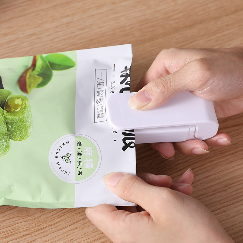 Snack sealing machine Small mini -handed packaging home plastic bag…