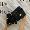 Black gift box with bow, wallet, belt, razor, pack, Birthday gift