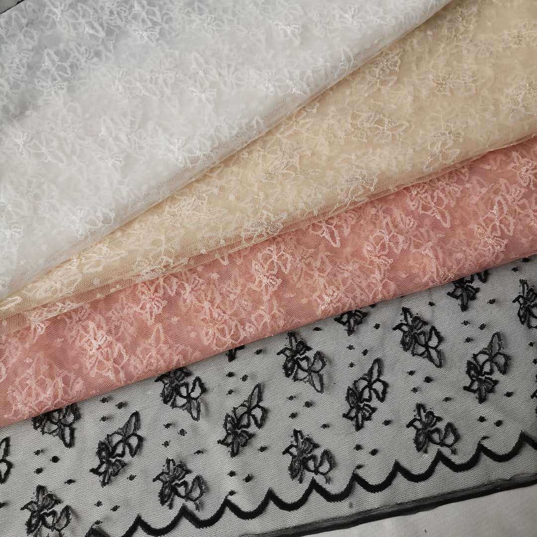 新款轻盈透薄锦纶有光蝴蝶点点剪线波浪边提花网纱 颜色现货供应