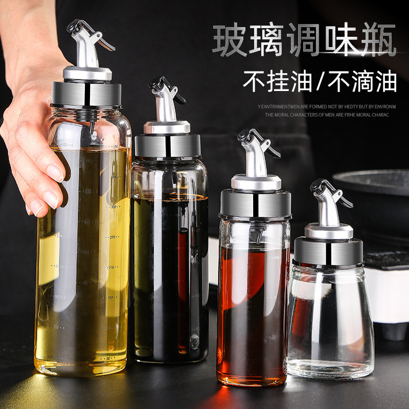 Manufacturer's direct sales glass oil bottle sealed leak-proof kitchen supplies stainless steel press oil pot seasoning bottle soy sauce bottle 