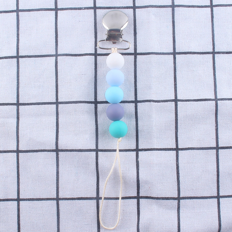 Cadena de pezón de silicona calmante Nuevo clip de hierro clip de pezón Dispositivo de molienda de dientes de bebé cadena anti-caída cadena anti-perdida