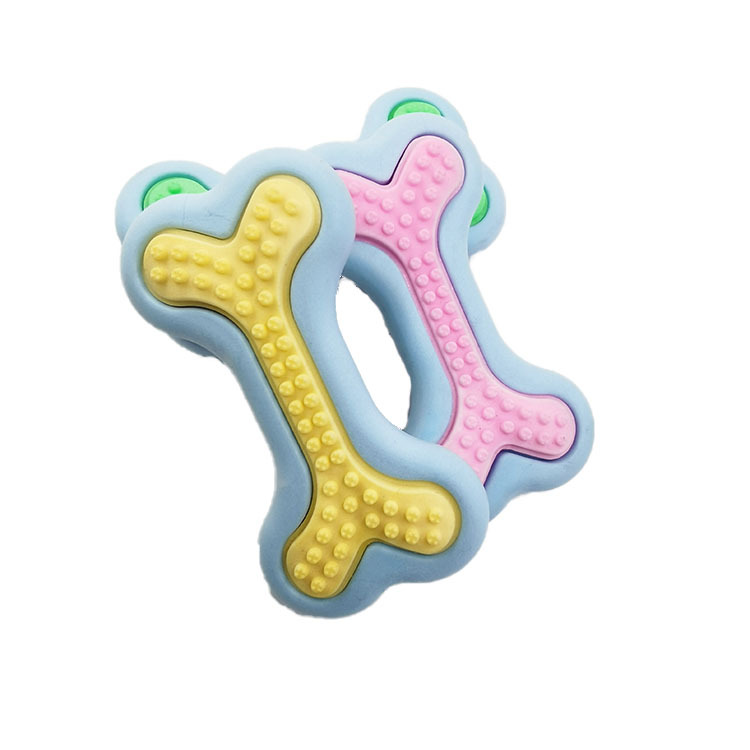 Juguete para mascotas TPR espuma sabor a la leche resistente al desgaste resistente a la mordedura cabeza de limpieza de huesos de dientes Amazon transfronterizo nuevo juguete para perros
