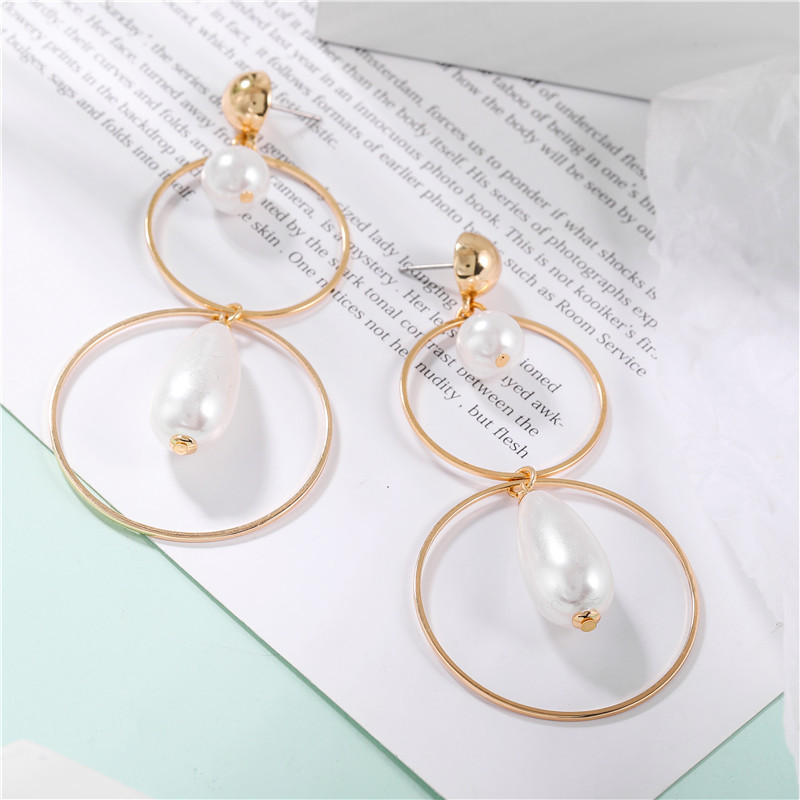 Korean New Fashion Wild Pearl Hollow Circle Geometric Long Earrings Wholesale display picture 11