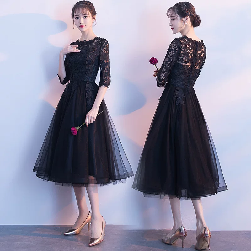 Black evening dress, 2020, asymmetric cut