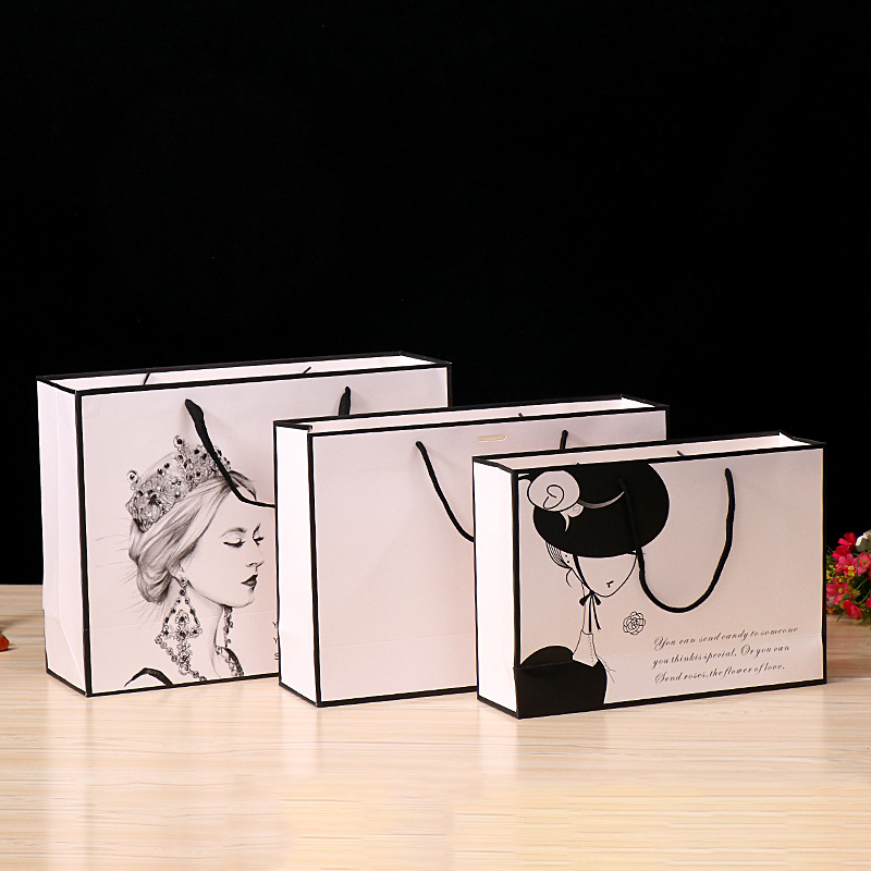 工厂定制 服装白卡纸袋通用空白礼品包装袋购物手提纸袋 定做log