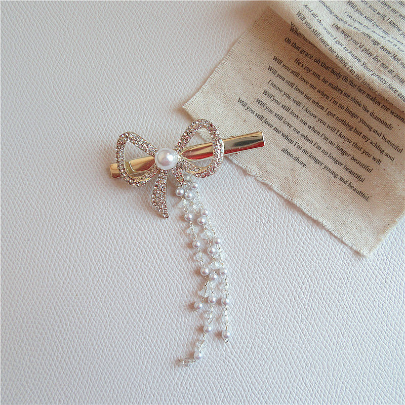 Pearl Rhinestone Butterfly Hairpin Retro Style Hair Clip display picture 2