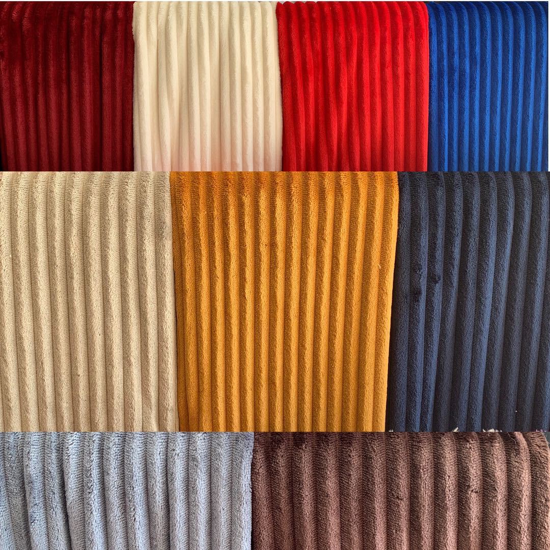 厂里直销现货批发单面抽条法兰绒面料全涤家纺地毯家居服面料