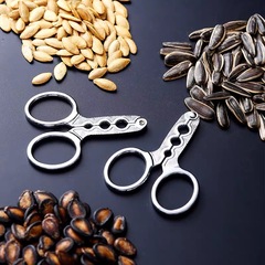 Factory direct sales zinc alloy melon seed clip to peel melon seeds and peelers to open melon seeds and pine nuts for lazy people to eat watermelon seeds and pine nuts.