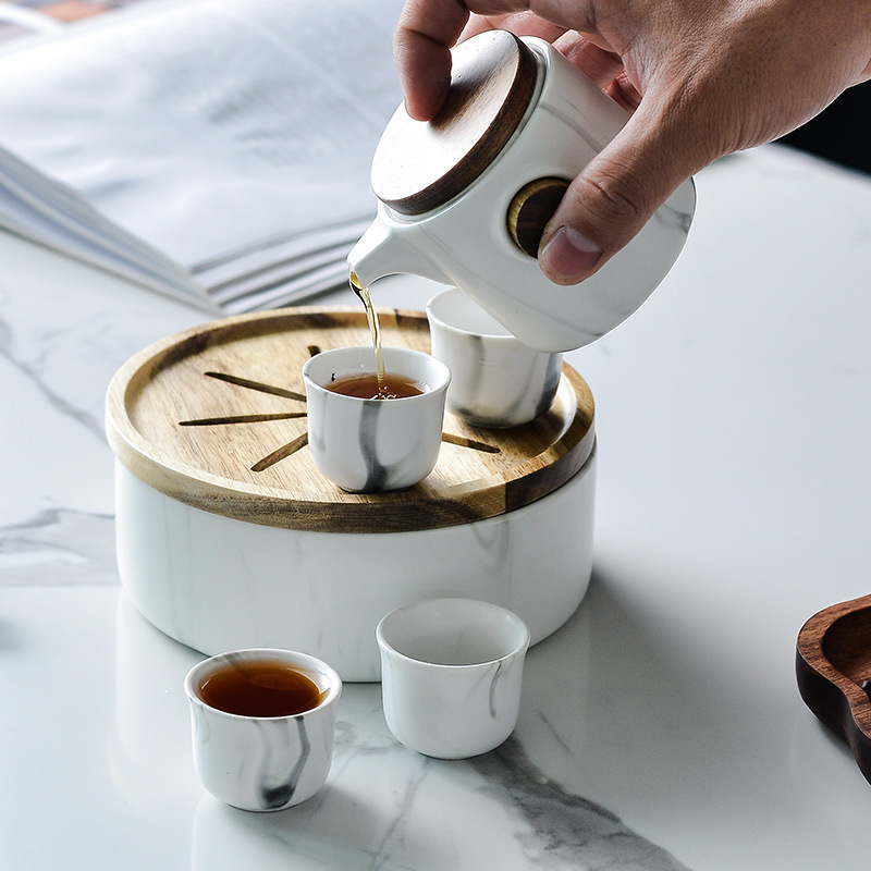 Marbling creativo juego de té de Kung Fu japonés simple juego de té de viaje logotipo personalizado una olla cuatro tazas juego de té traje