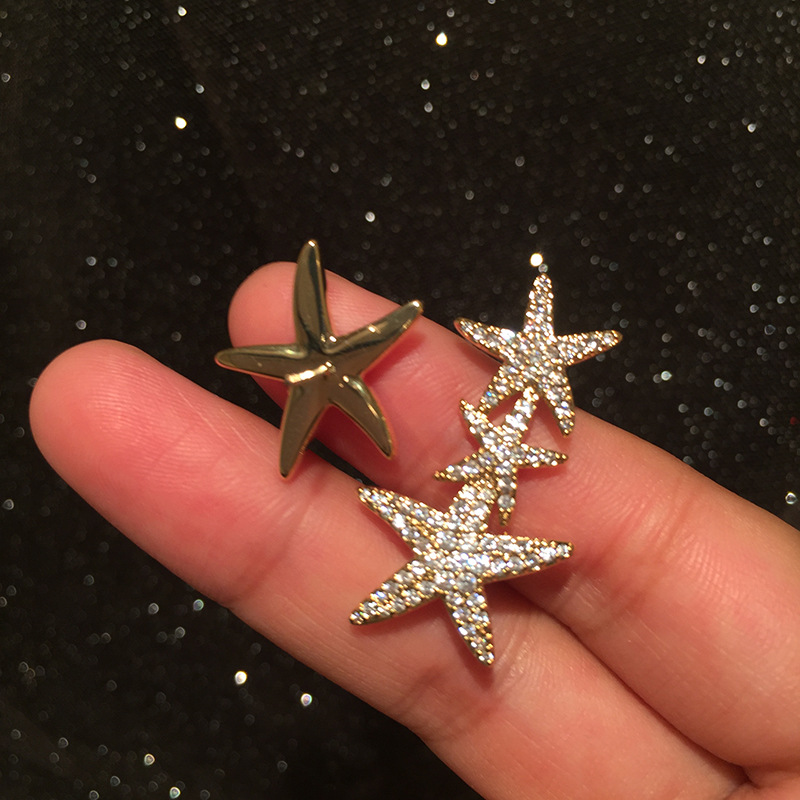 Pendientes De Estrella Asimétrica Estilo De Vacaciones Estrella De Cinco Puntas S925 Aguja De Plata Pendientes De Estrella De Mar Dorados Compactos Venta Al Por Mayor Nihaojewelry display picture 3