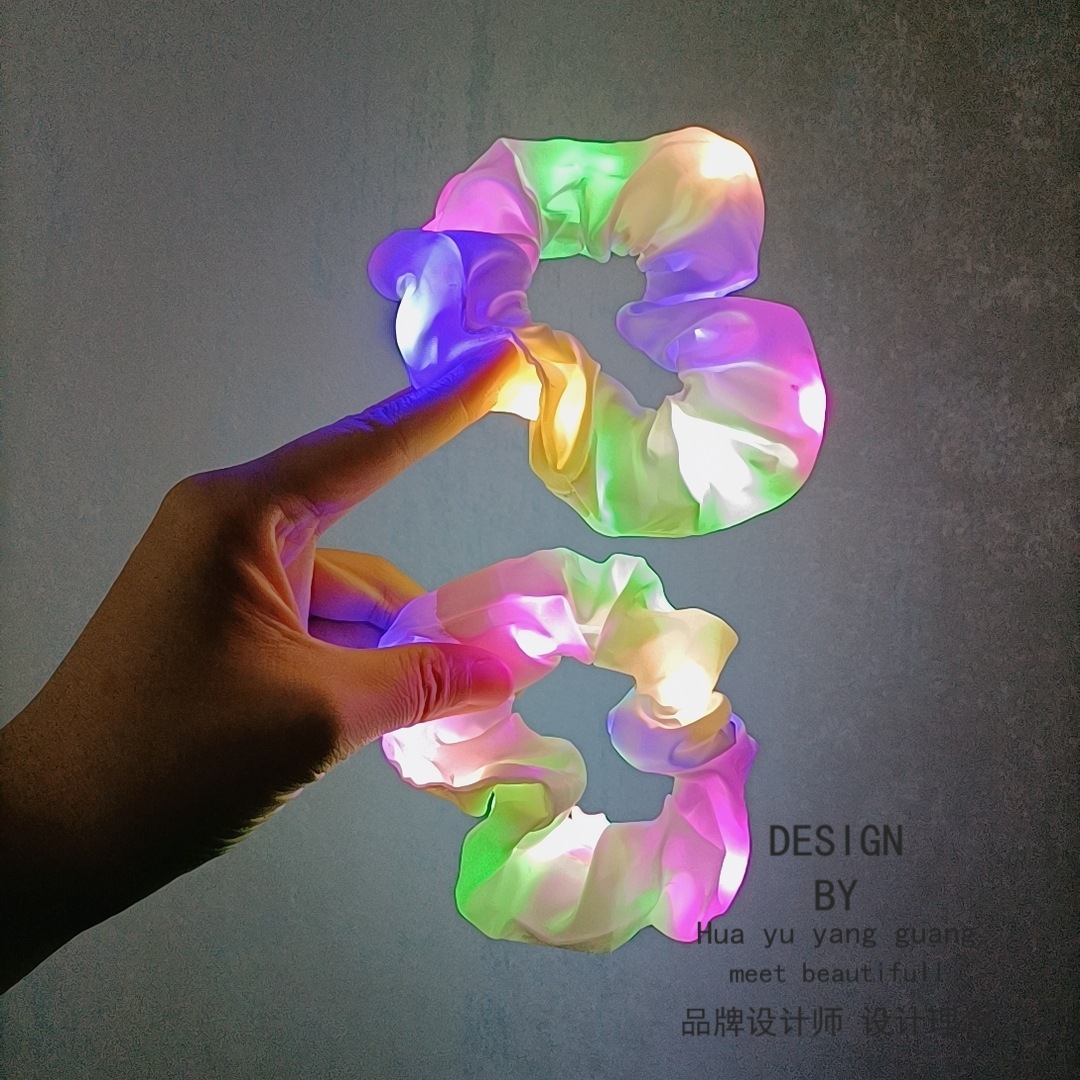 Europa y los Estados Unidos personalizados LED brillante anillo de pelo colorido intestino lluvia flores sol marca muestra personalizada brillante cabello cuerda de pelo