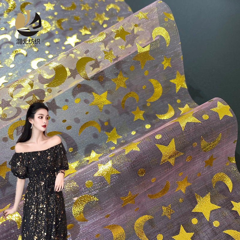 Fabricante suministro de ergena estrellas de la luna estampado tela de red de embalaje de boda bolsa tela de vestido